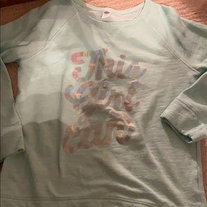 Teal long sleeved shirt